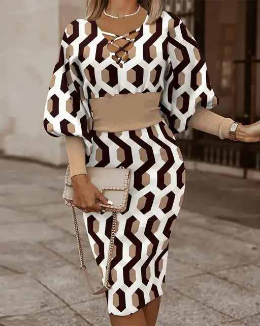 Elegant V-neck long sleeve women’s pencil dress by Plush Fashion Hub, showcasing a fitted silhouette and sophisticated style.