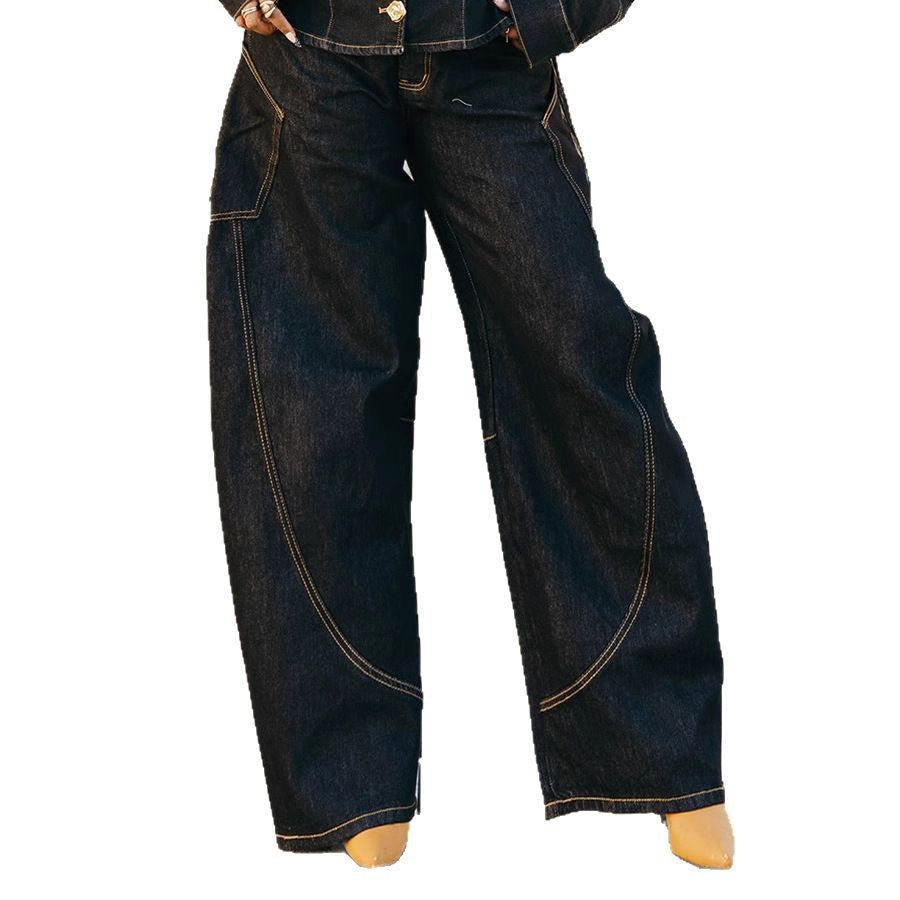Curved hem stitched denim jeans by Plush Fashion Hub, showcasing stylish blue jeans with detailed stitching and a relaxed fit.