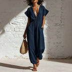 Women's deep V-neck three-quarter sleeve high waist wide-leg pants by FitiqueFit, shown in dark fabric with relaxed fit style.