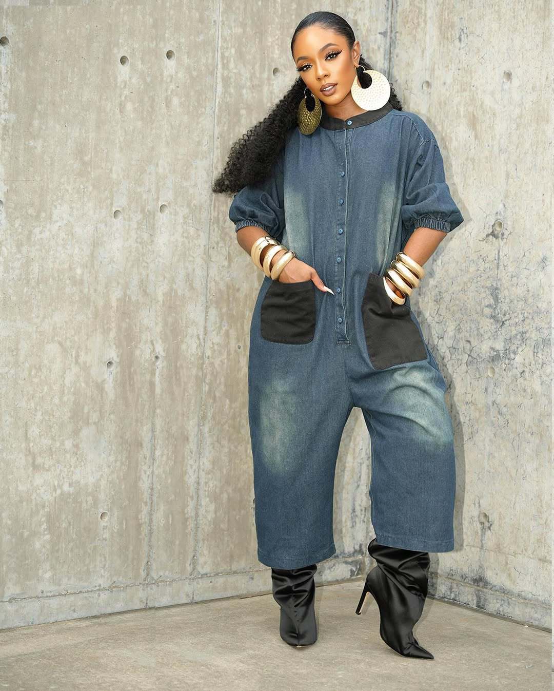 Color-block patchwork denim wide-leg jumpsuit by Plush Fashion Hub, featuring vibrant panels and a relaxed fit.