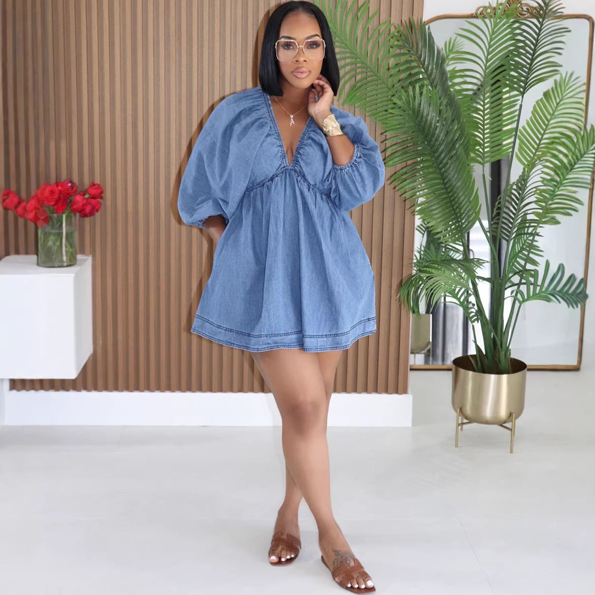 Sexy women's deep V-neck bubble sleeve denim mini dress by eprolo, featuring a fitted silhouette and stylish design.