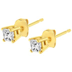 14K yellow gold princess-cut diamond stud earrings with near colorless I-J diamonds and classic four-prong setting.