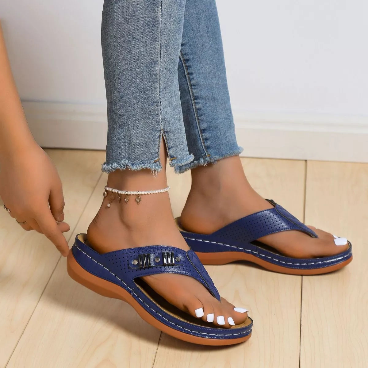 Women's stylish wedge sandals with comfortable toe post design, trendy summer footwear by Trendsi.