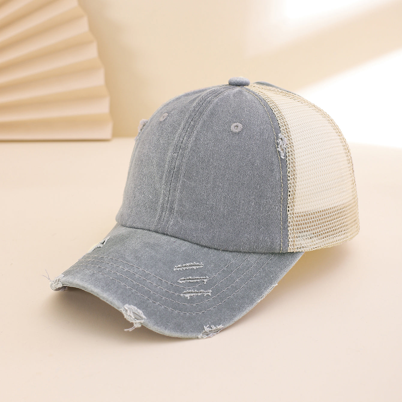 Distressed washed mesh baseball cap with frayed edges, unisex outdoor and daily wear hat by Plush Fashion Hub.