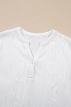 Wavy textured Raina tee from Threaded Pear featuring a relaxed fit and soft fabric, styled on a model.