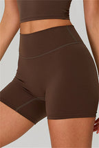Fitglutes activewear one-shoulder crop top and shorts 2-piece set, ideal for gym and workout activities.