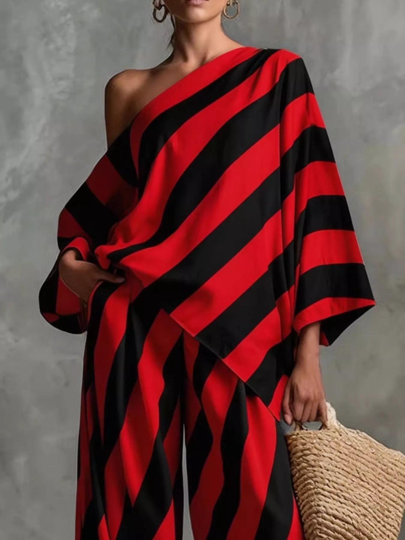 Plus size Shopimist striped one-shoulder top with wide-leg pants set, featuring bold horizontal stripes and a stylish design.