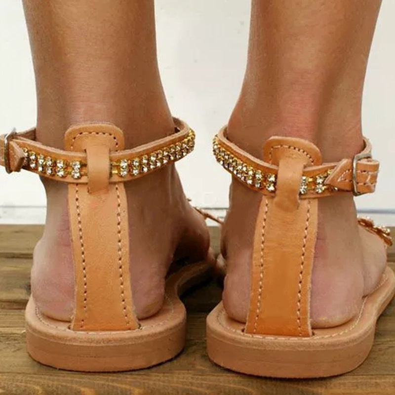 Women's rhinestone flat sandals with large size, word buckle strap design by Plush Fashion Hub, showcasing the stylish footwear.