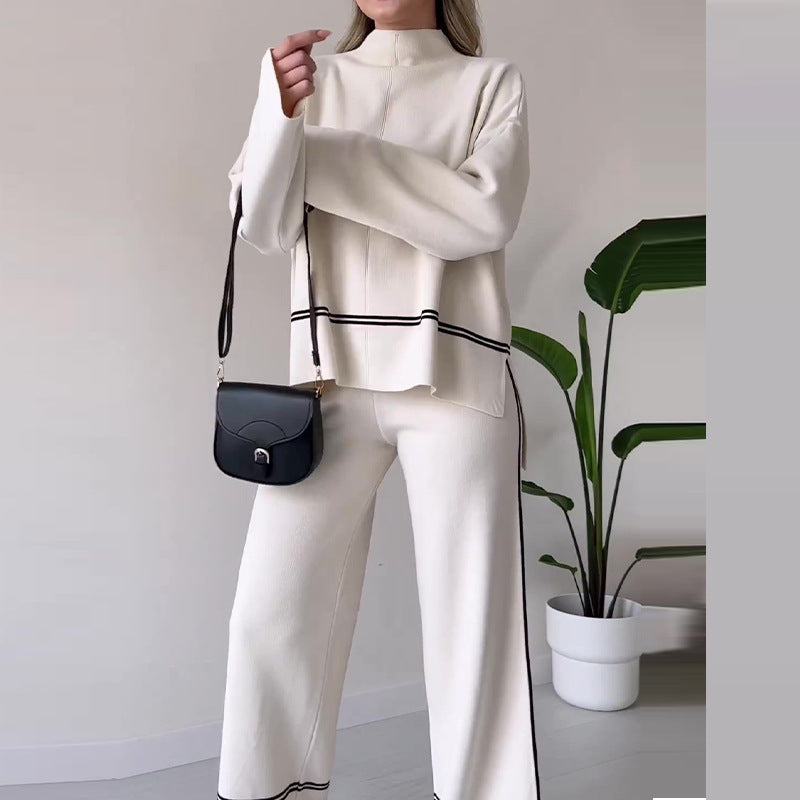 Women’s solid color casual two-piece set by FitiqueFit featuring a loose top and bootcut pants, perfect for comfortable everyday wear.