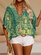 Women's printed V-neck half sleeve casual top from Plush Fashion Hub, featuring soft stretch fabric and stylish office blouse design.