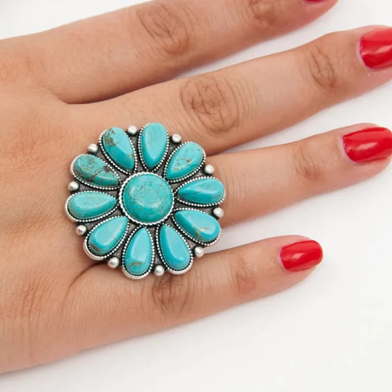 Artificial turquoise alloy flower ring featuring a decorative floral design, crafted by Plush Fashion Hub.