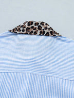 Women's leopard print short sleeve dress with contrast collar by Plush Fashion Hub, featuring a stylish and comfortable design.