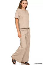 Women's cotton slub short sleeve tee and lounge pants set, comfortable loungewear set by Trendsi featuring relaxed fit and soft fabric.