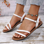 Open toe flats sandals in neutral tone from Shopimist, featuring a minimalist design and comfortable slip-on style.