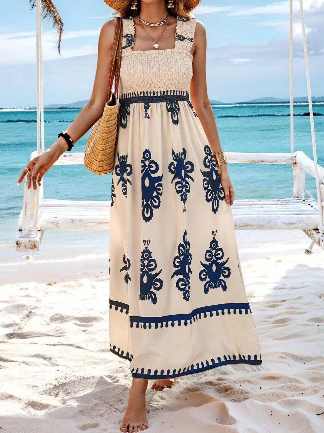 Plush Fashion Hub smocked printed wide strap maxi dress with flowing fabric and vibrant floral pattern, perfect for summer wear.