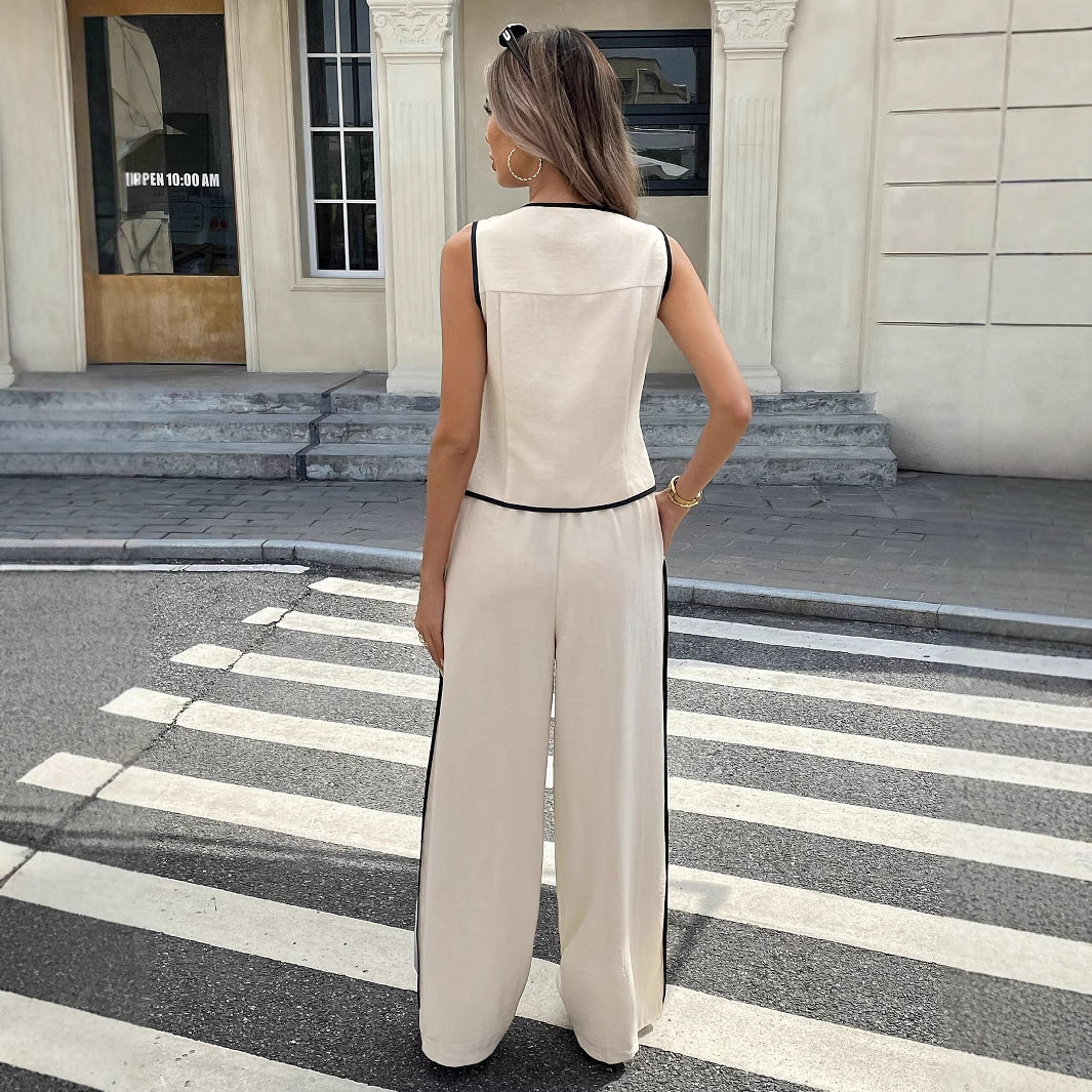 Women's contrast color sleeveless vest and drawstring trousers suit by FitiqueFit, shown in four different color options.