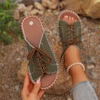 Women's faux leather lace-up open toe flat sandals by Trendsi, featuring stylish design and comfortable flat sole.
