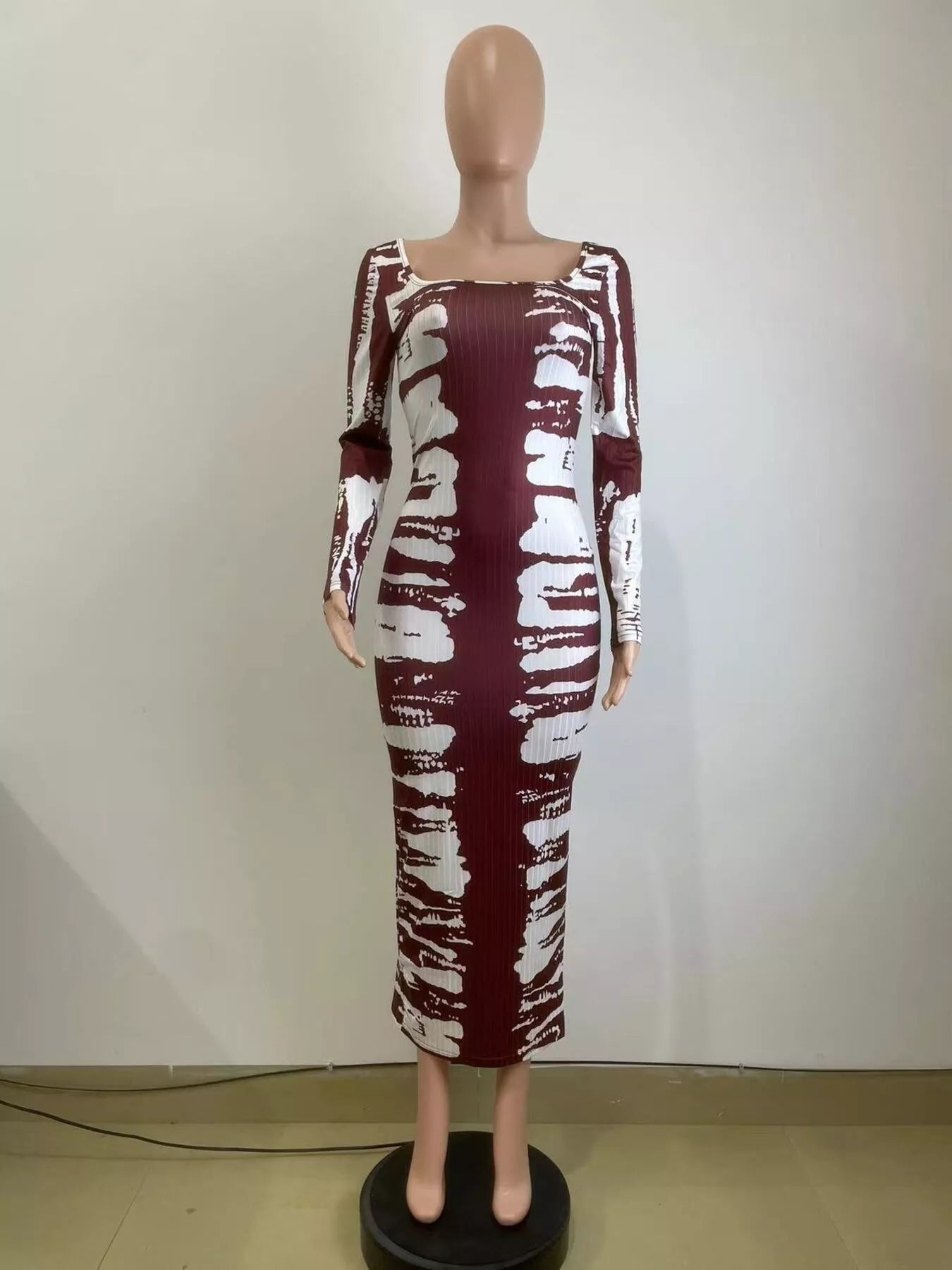 Shopimist tie-dye long sleeve maxi dress with vibrant swirl patterns, flowing fabric, and a comfortable, stylish fit.