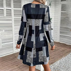 Women's round neck long sleeve casual dress by Plush Fashion Hub, soft fabric, knee-length with a relaxed fit.