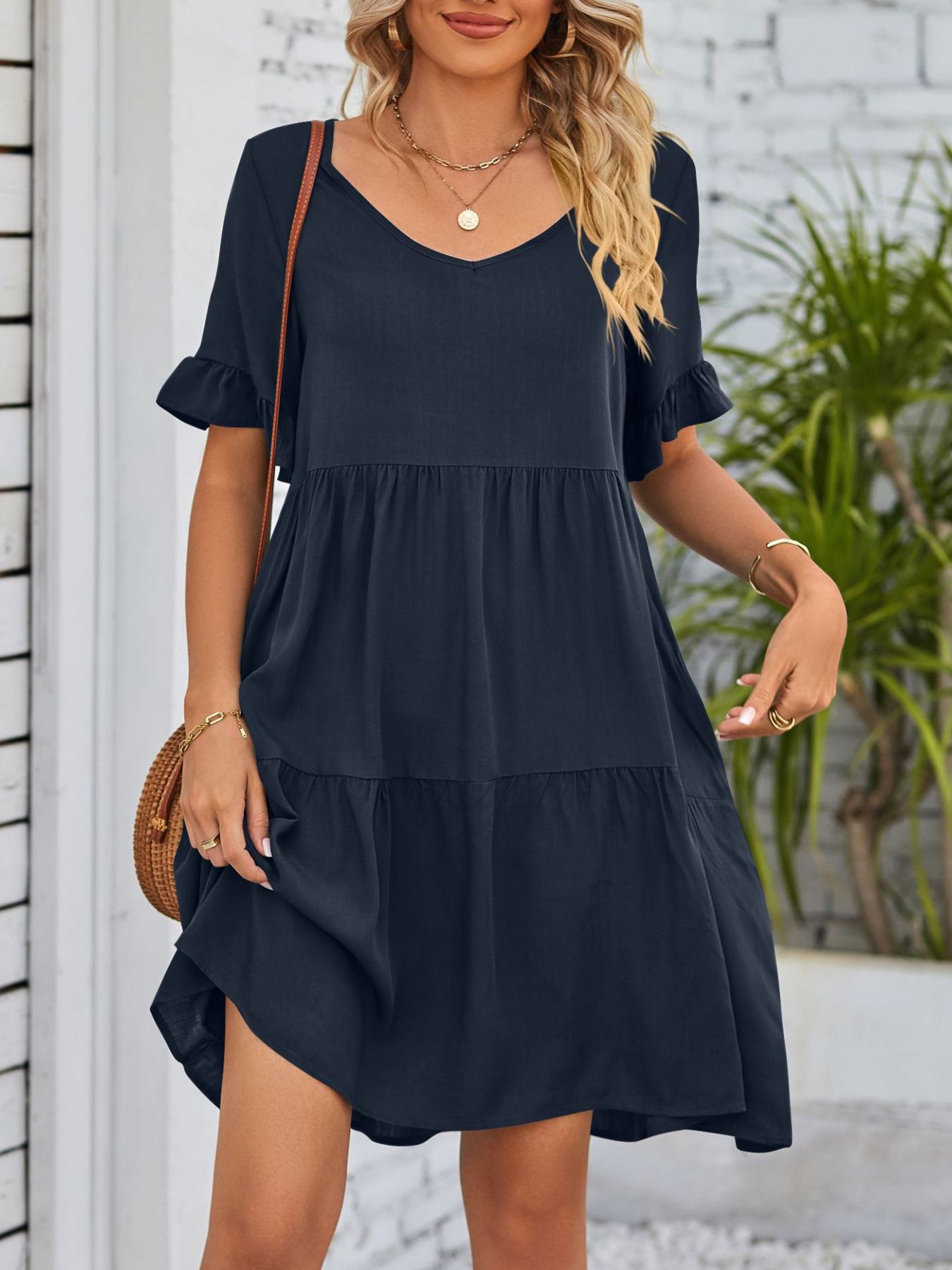 Lightweight rayon ruffled sleeve tiered mini dress with pockets, trendy and feminine, by Trendsi.