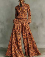 Leopard print wide-leg pants set for women, casual two-piece outfit by Plush Fashion Hub, displayed on a hanger.