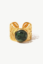 18k gold plated malachite leaf ring with intricate design, showcasing vibrant green stone and delicate leaf detailing.