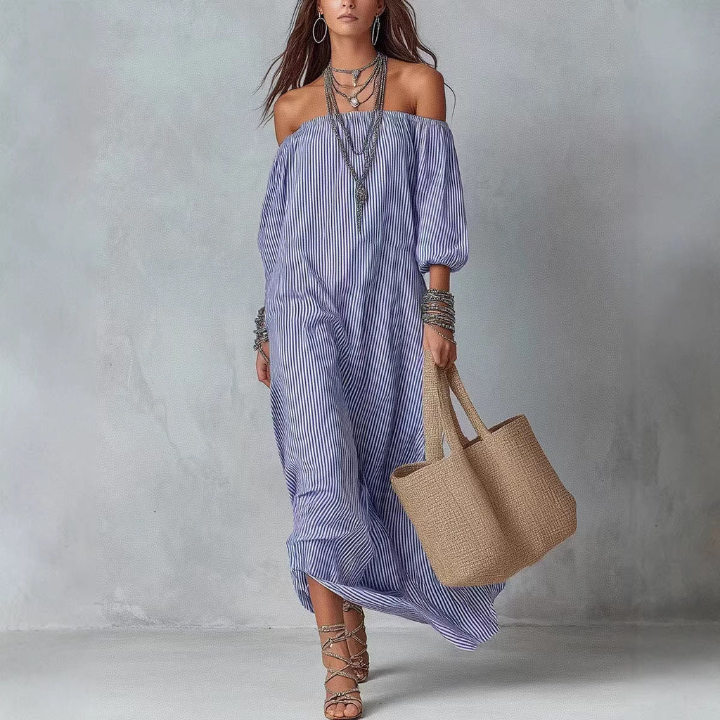 Women's striped loose-fit flared maxi dress by FitiqueFit, featuring a flowing design perfect for holiday and vacation wear.