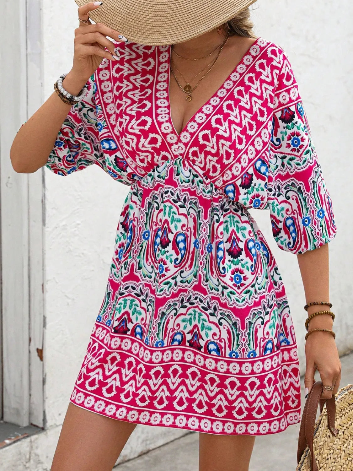 Printed tie-back mini dress by Plush Fashion Hub featuring half sleeves and a stylish design perfect for casual or dressy occasions.