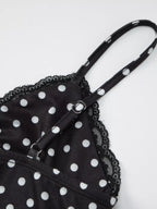 Polka dot lace trim cami top by Shopimist featuring a delicate lace neckline and polka dot fabric in a casual sleeveless design.