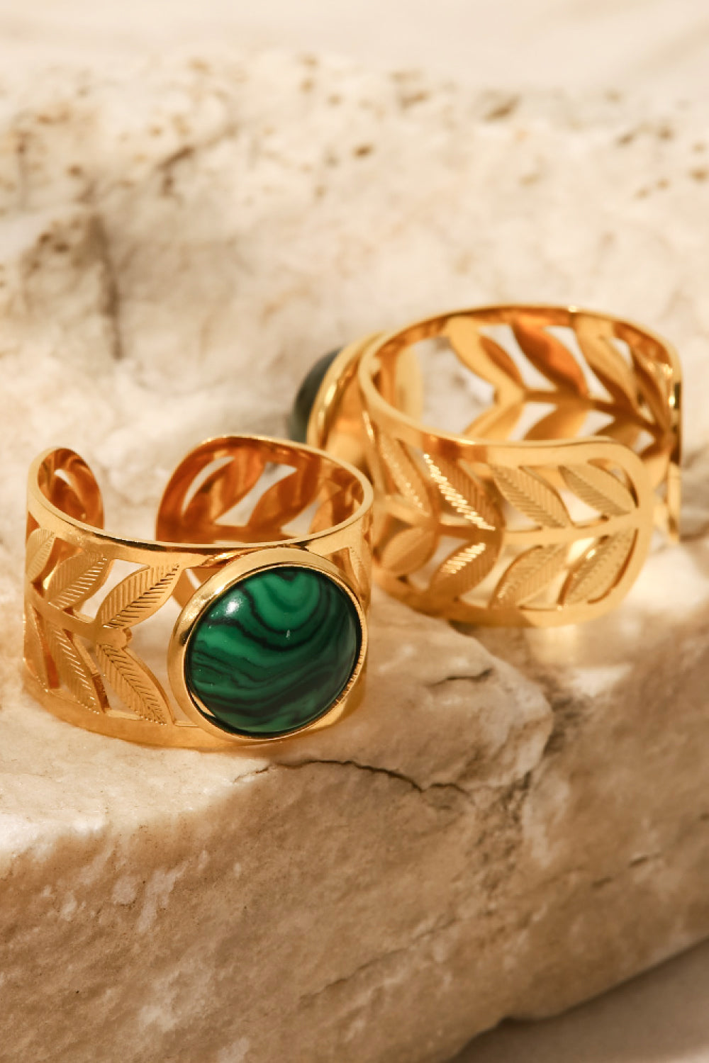 18k gold plated malachite leaf ring with intricate leaf design and vibrant green stone, elegant jewelry piece.