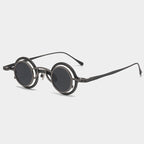 Pure titanium small round sunglasses by Plush Fashion Hub featuring retro-style luxury eyewear with sleek round frames.
