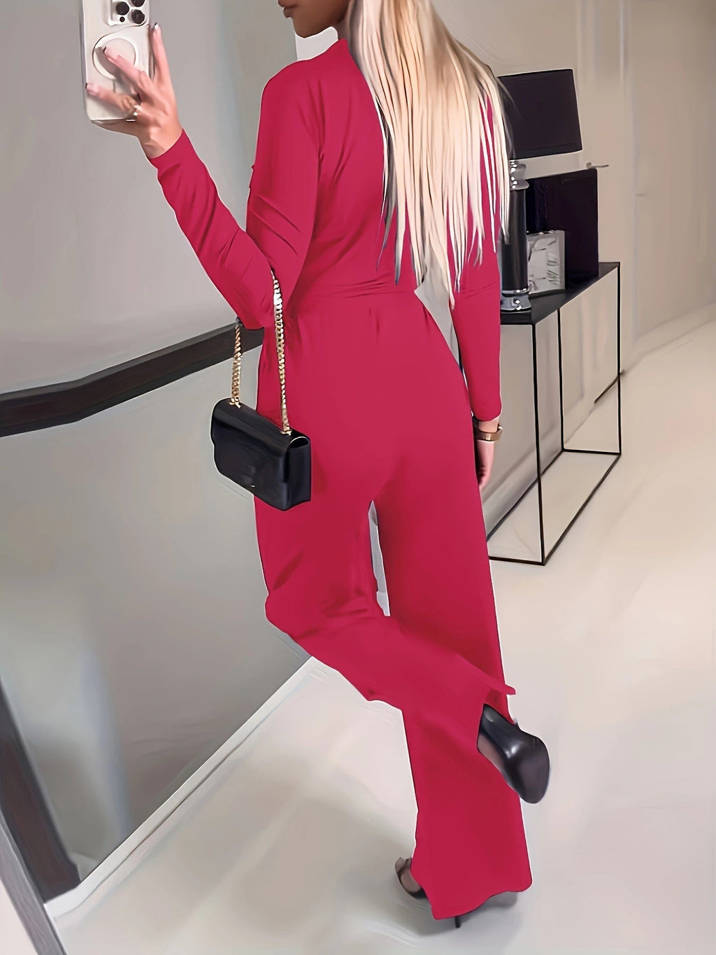 Women's solid V-neck jumpsuit with bow tie waist, slim fit casualwear from FitiqueFit, featuring a stylish and comfortable design.
