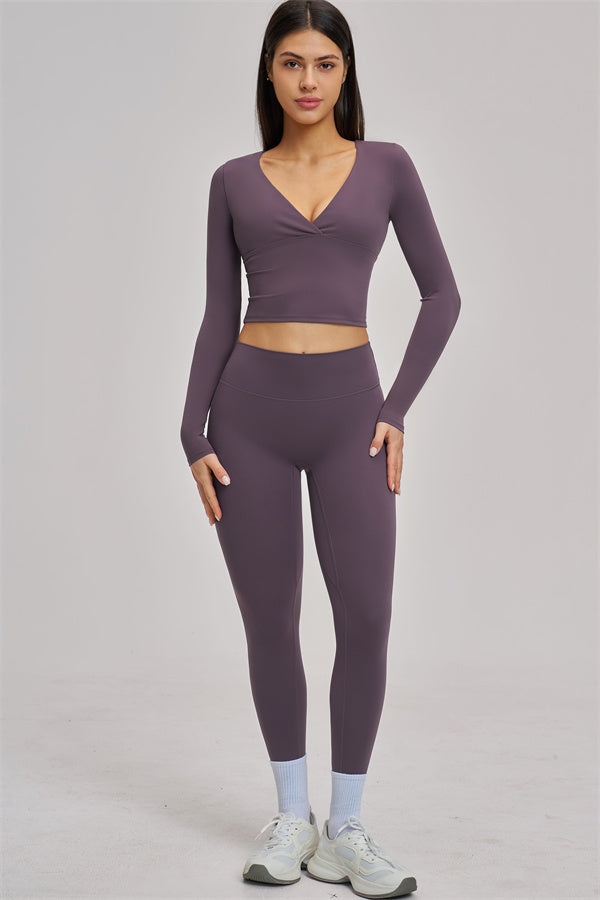 Fitglutes Activewear long sleeve crop top with a fitted design, perfect for gym workouts and athletic training.