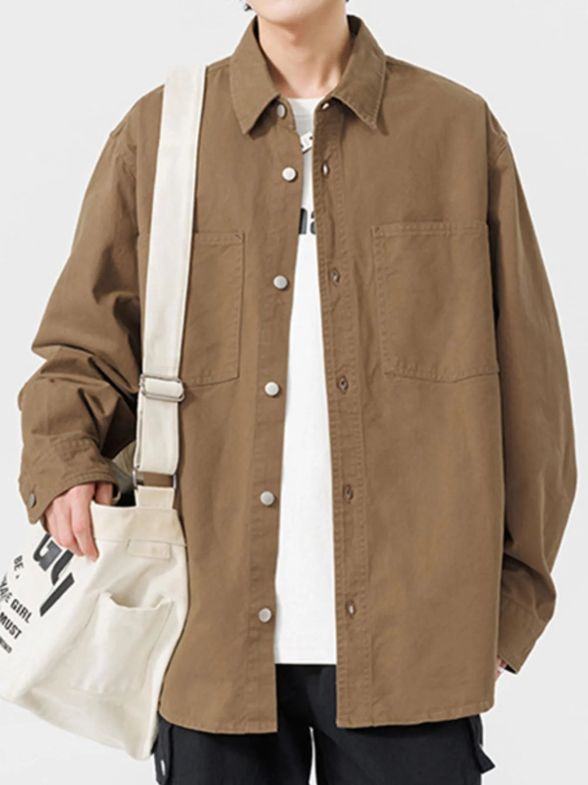 Men's long sleeve button-up shirt by Trendsi, shown in a casual fit with a collar and button closure, in a versatile style.