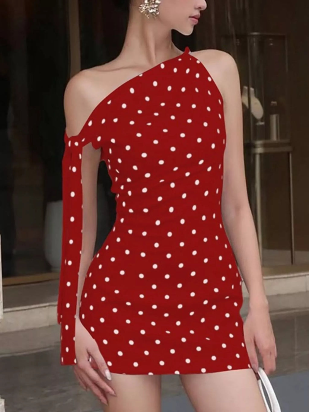 Polka dot sleeveless mini dress with bow accents by Shopimist, featuring a playful pattern and stylish design.