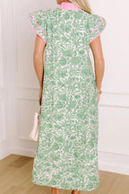 Floral midi dress with contrast trim and flutter sleeves by Plush Fashion Hub, featuring a flowy design and vibrant floral pattern.