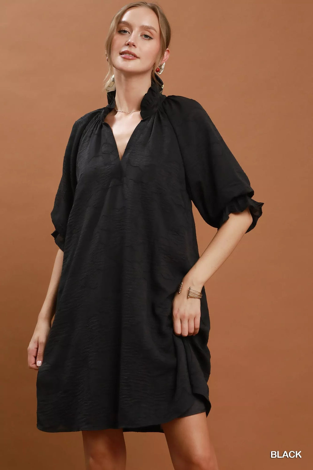 Umgee floral textured jacquard V-neck dress with a stylish pattern, perfect for casual or semi-formal wear.