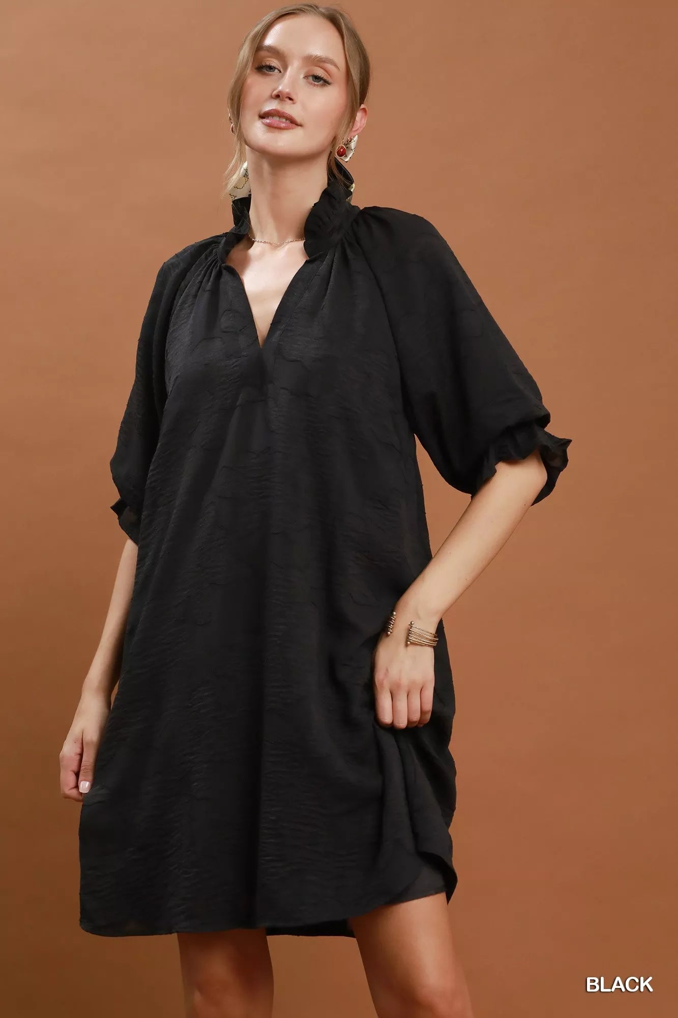 Umgee floral textured jacquard V-neck dress with a stylish pattern, perfect for casual or semi-formal wear.