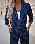 Women's spring striped suit by Plush Fashion Hub featuring a cropped long sleeve top and straight pants, casual and stylish outfit.