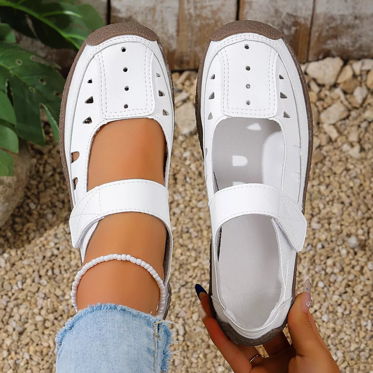 Round toe platform slip-on footwear by Trendsi featuring a sleek design and comfortable sole.