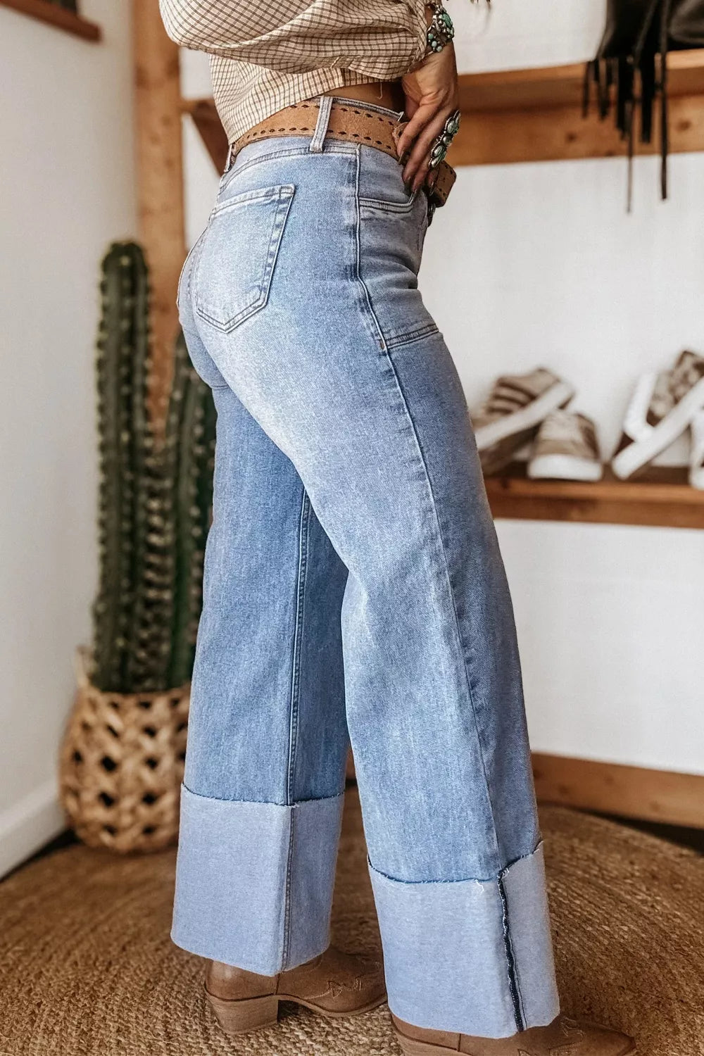 Loose fit turn-up cuffs jeans by Plush Fashion Hub featuring a casual style and classic denim look.