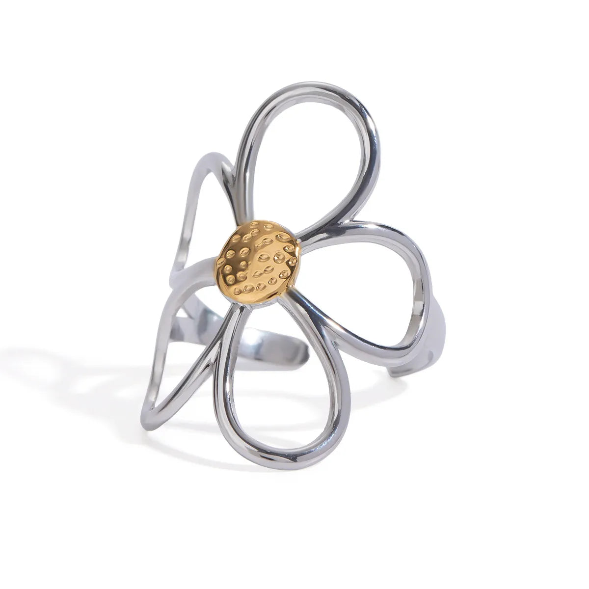 Two-tone daisy flower ring from Plush Fashion Hub showing a delicate floral design with mixed metal finishes.