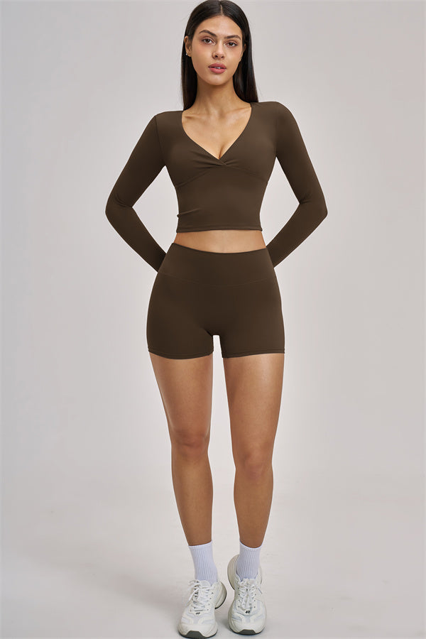 Fitglutes Activewear long sleeve crop top with a fitted design, perfect for gym workouts and activewear styling.