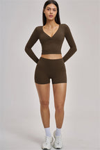 Fitglutes Activewear long sleeve crop top with a fitted design, perfect for gym workouts and activewear styling.
