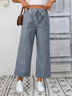 Women's striped wide-leg drawstring pants with pockets, trendy and comfortable fashion by Trendsi.