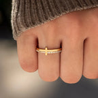 Sterling silver cross ring with detailed design, crafted from 925 sterling silver, showcasing a sleek and elegant jewelry piece.