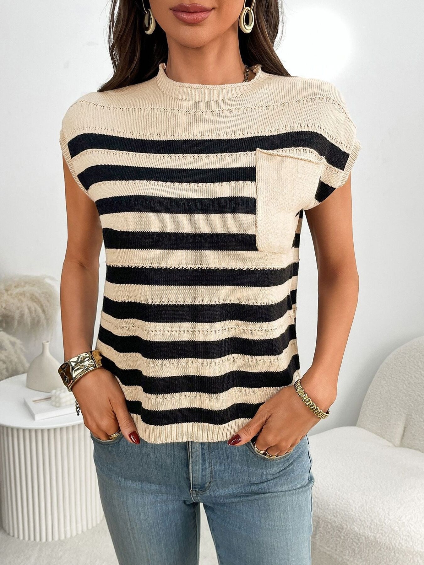 Women's striped knit cap sleeve sweater with front pocket, casual outerwear by Trendsi, featuring a cozy knit design and relaxed fit.