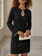 Elegant keyhole pearl trim mini dress by Trendsi, chic cocktail party wear, features a stylish design with pearl accents and a fitted silhouette.