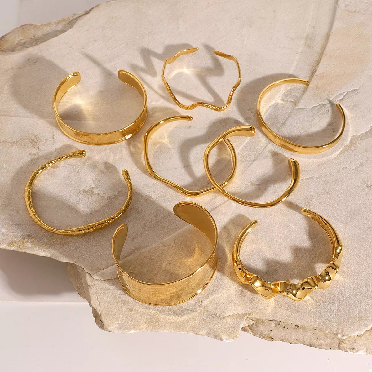 Gold-plated stainless steel open ring with a sleek design, perfect for stylish jewelry from Plush Fashion Hub.