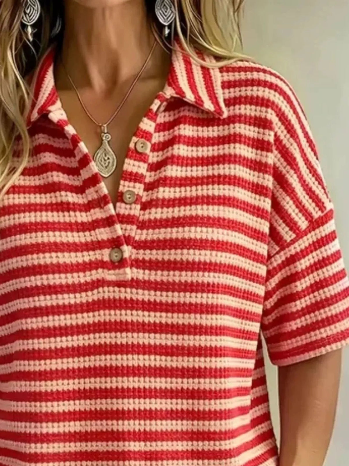 Plus size contrast striped knit polo shirt from Trendsi, showing a full-front view of the colorful, fitted tops.